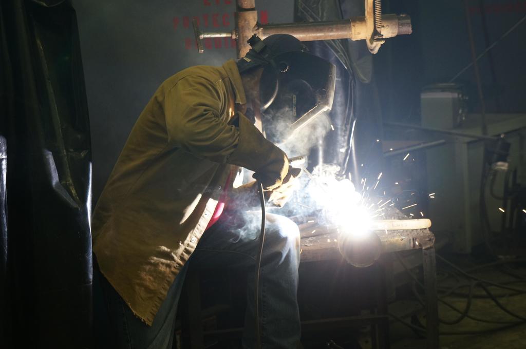 Student practices their welding